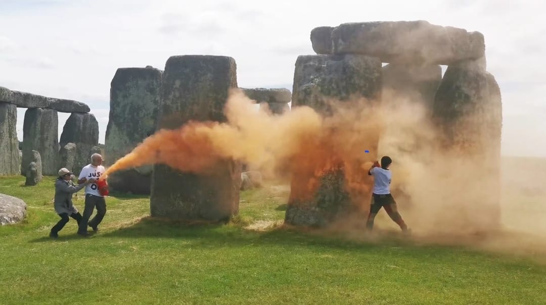 Why would you throw orange dust on Stonehenge, anyway?